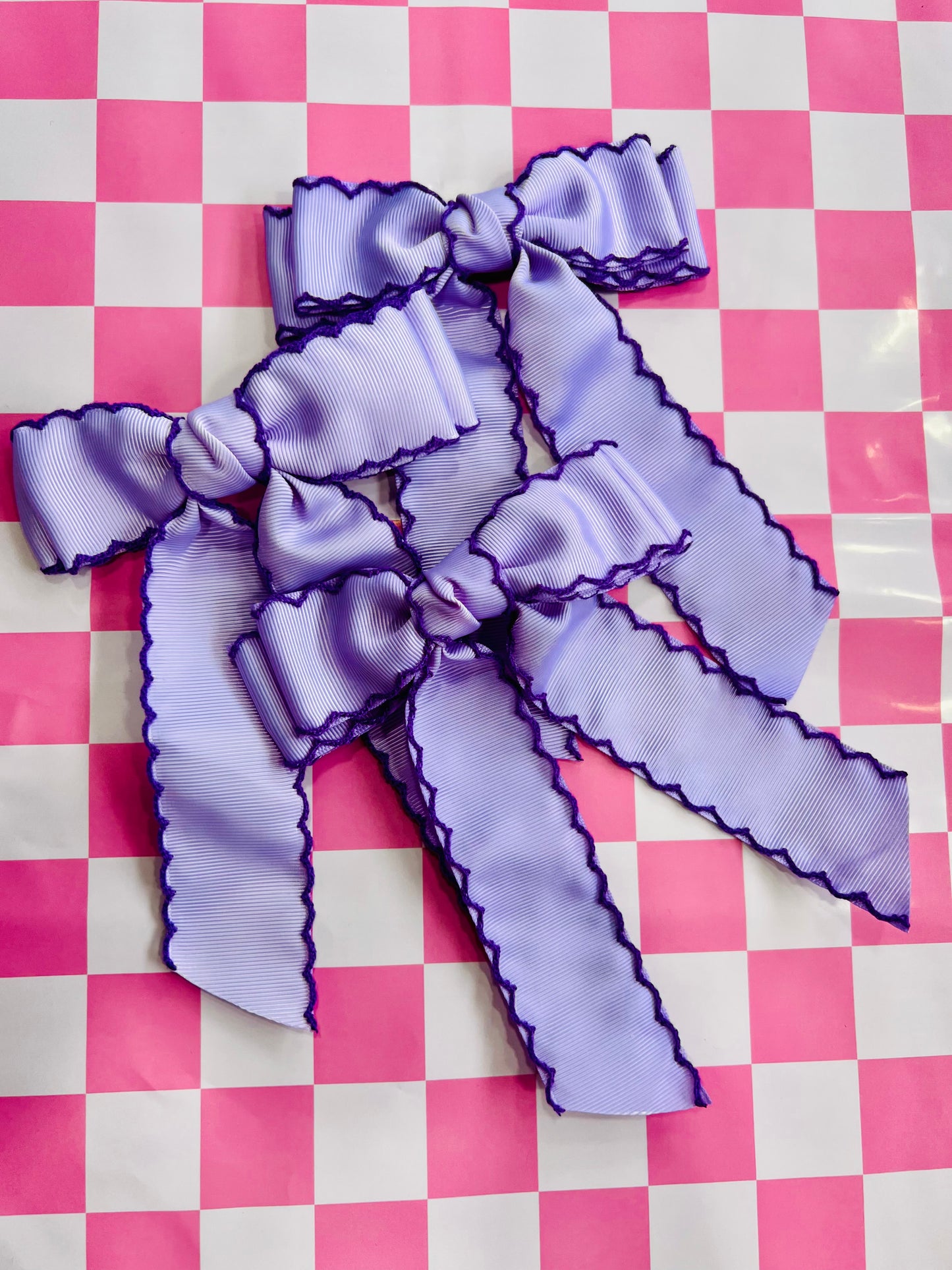 PURPLE SCALLOP BOW