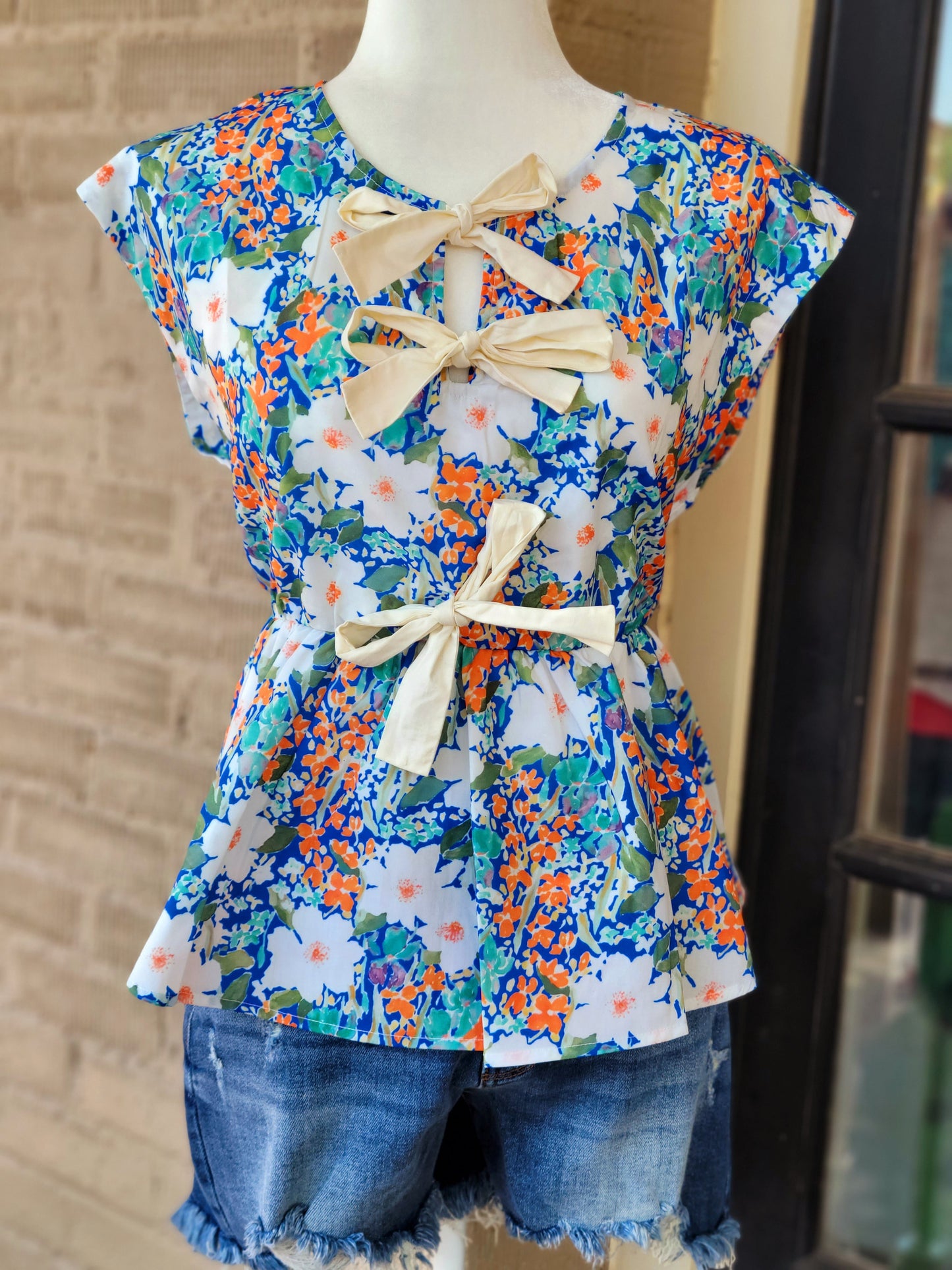 FLORAL BOW PEPLUM TOP