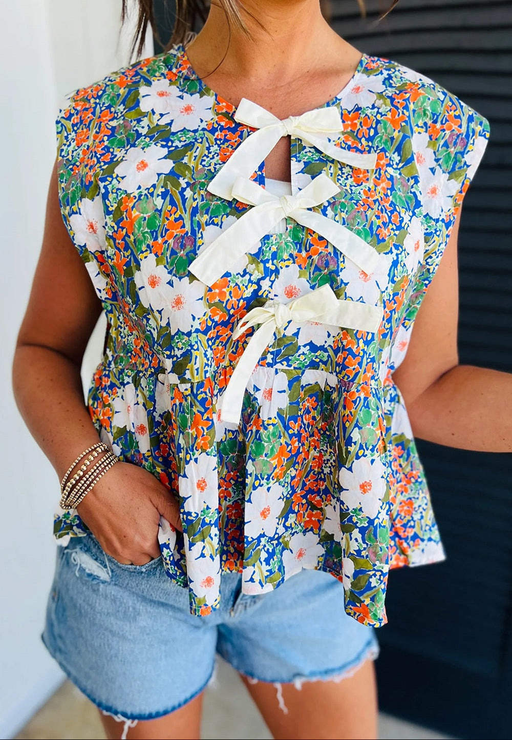 FLORAL BOW PEPLUM TOP