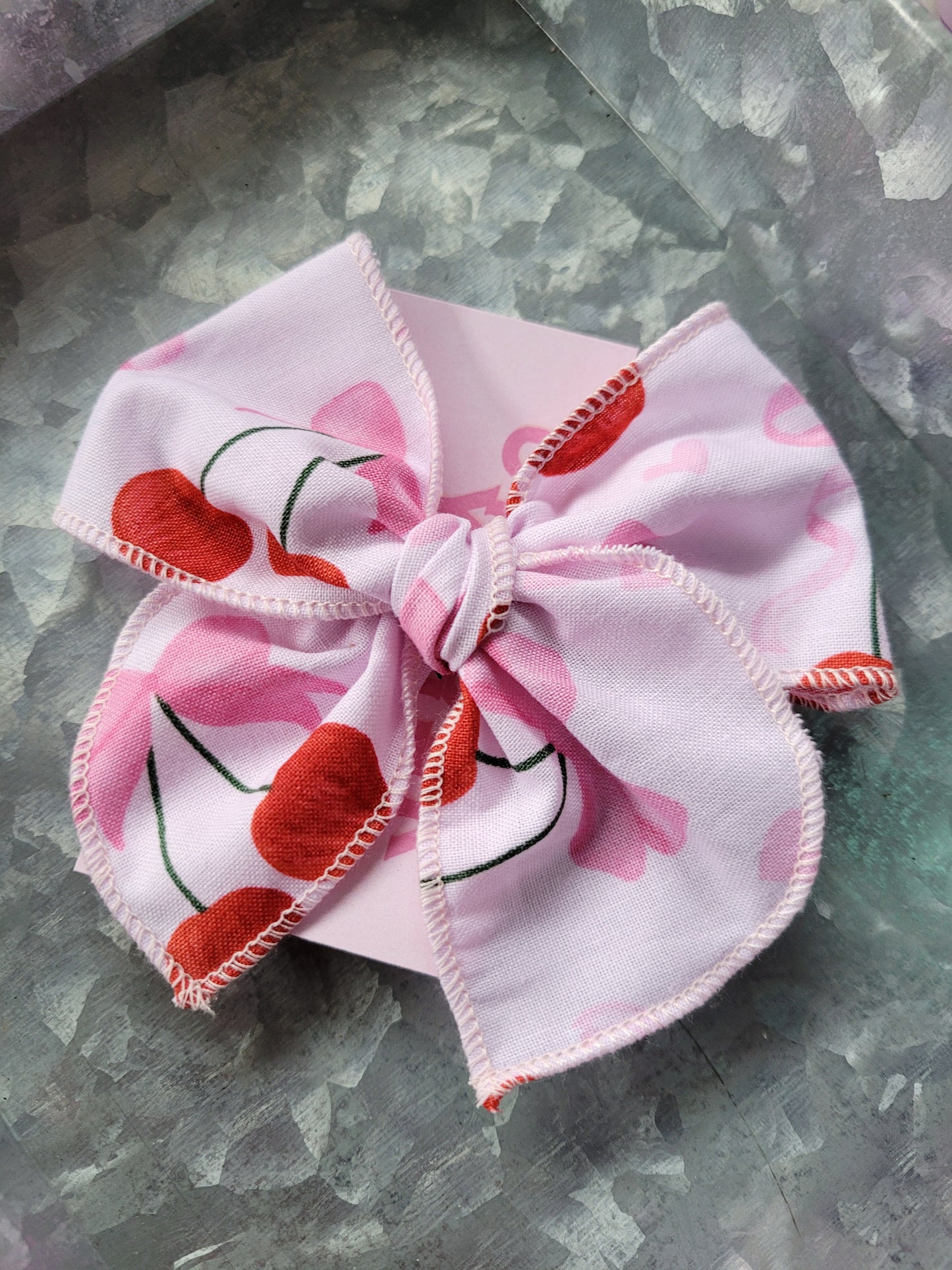 COQUETTE CHERRY BOW