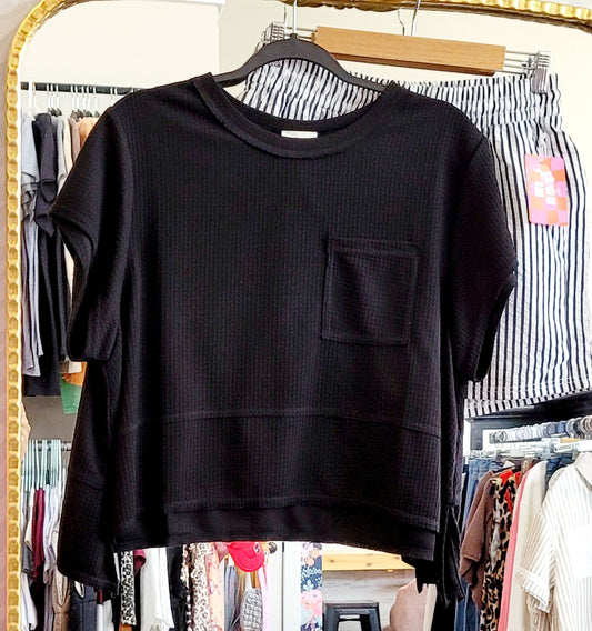 BLACK FLARED HEM TOP
